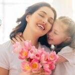 mamá, abuela y nietas felices